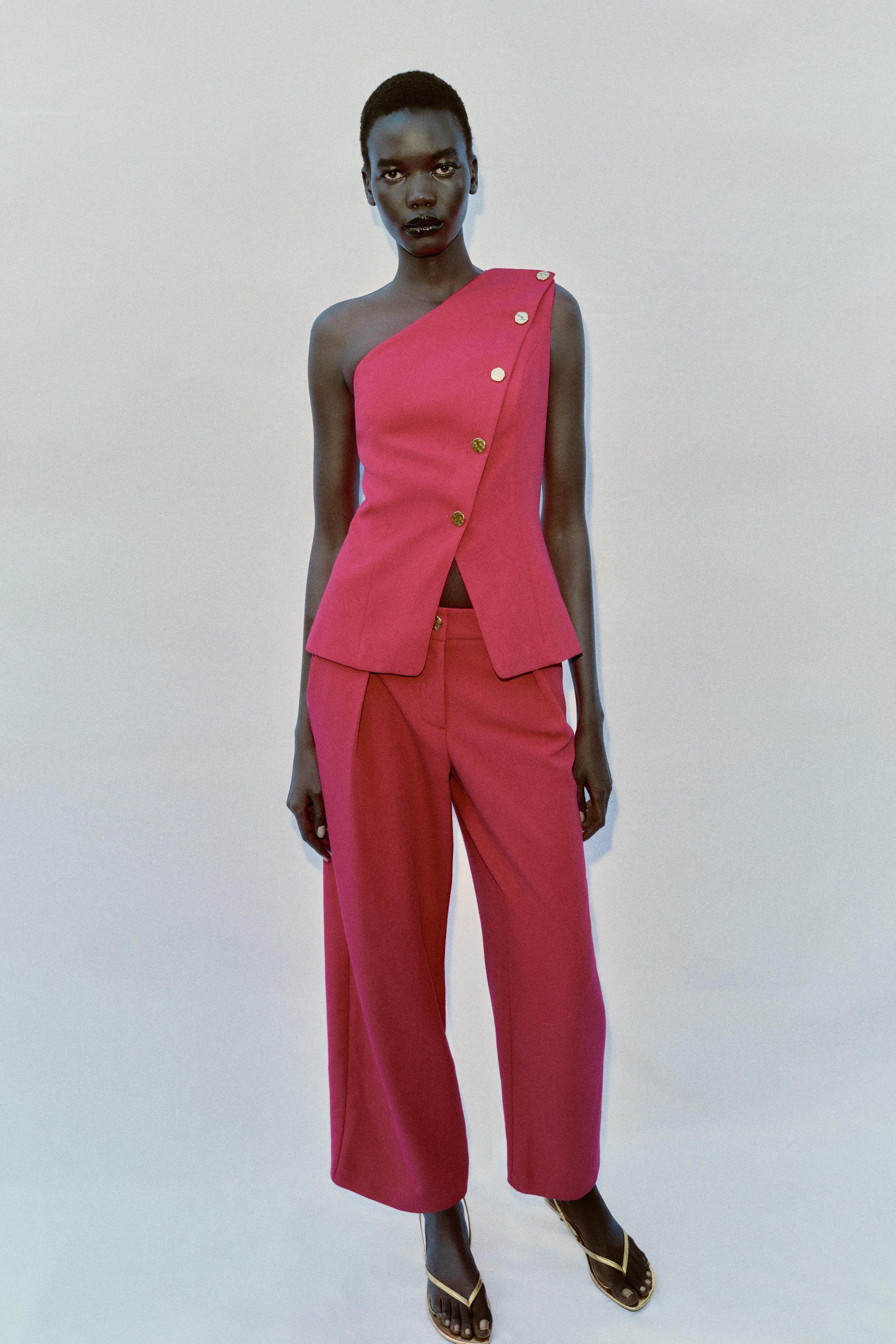 PLEATED TAPERED PANTS